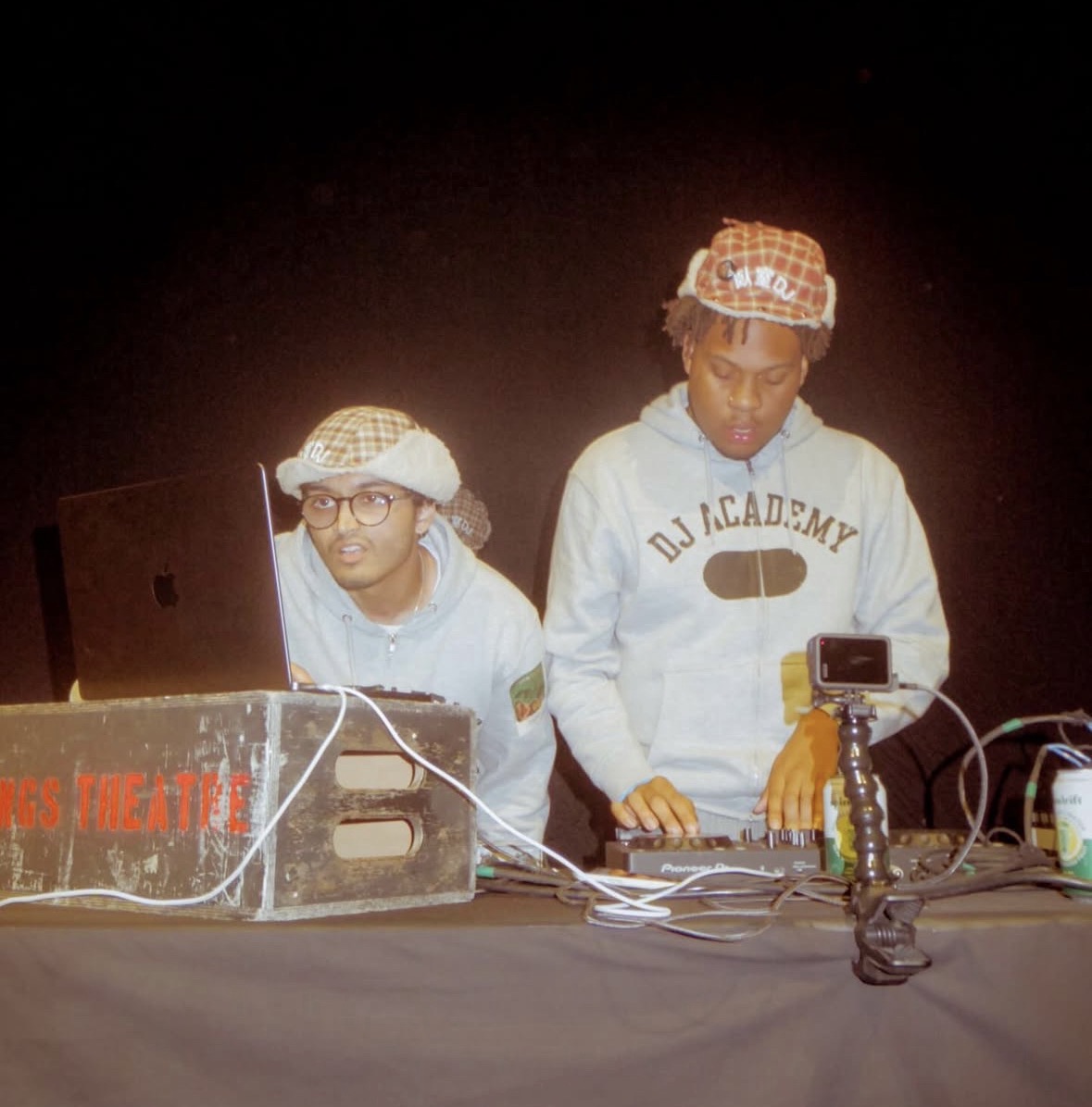 Two DJs behind the decks at Kings Theatre